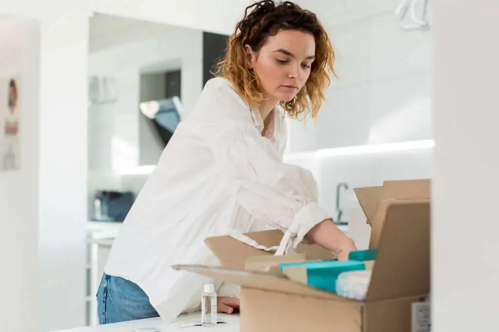medium-shot-woman-with-box_23-2148536438