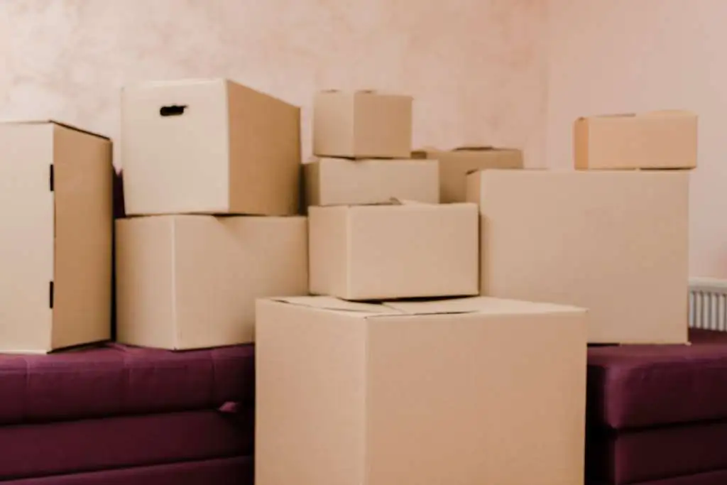 stack-boxes-couch_23-2147758897