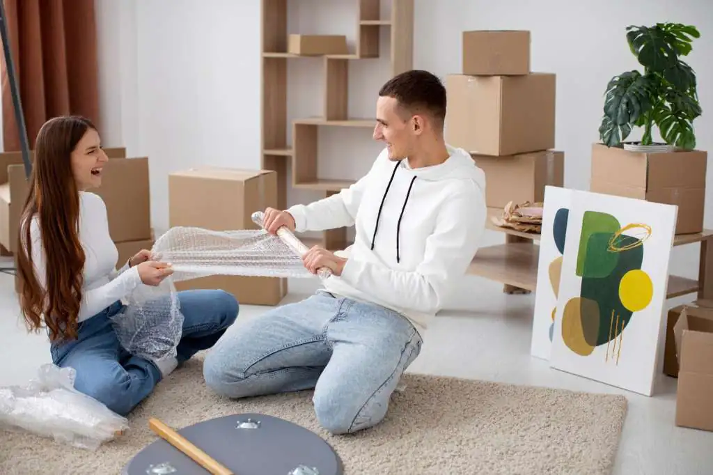 How to Pack Artwork for Moving: Step-by-Step Guide-2 couple-moving-their-new-house_23-2149275898
