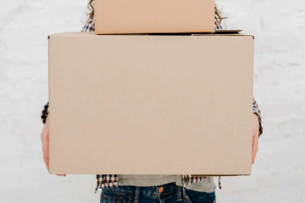 How to Pack Monitors for Moving-3 crop-woman-with-carton-boxes_23-2147758866