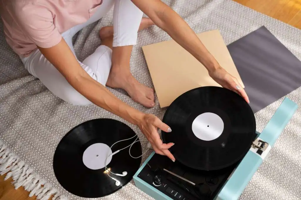 How to Pack Records for Moving-3 woman-relaxing-while-listening-music-home_23-2149061814